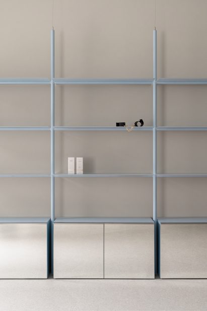 Baby blue metal display shelving