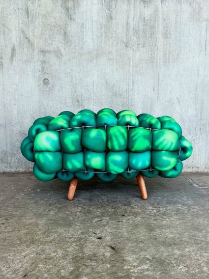 Pangolin bench with hand prints all over
