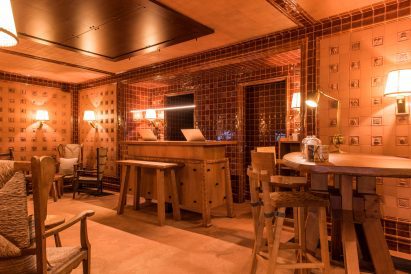 Terracotta tile clad reception desk area