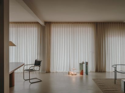 Wall of windows in Barcelona apartment by Iserns Serra