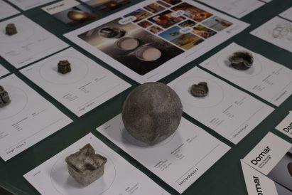 a photograph of material experiments placed on a wooden table