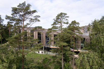 Lakehouse building in front of quarry