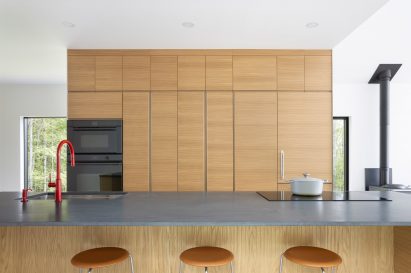 Kitchen with bright red tap