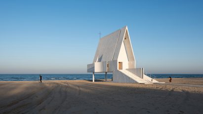 White chapel on seashore