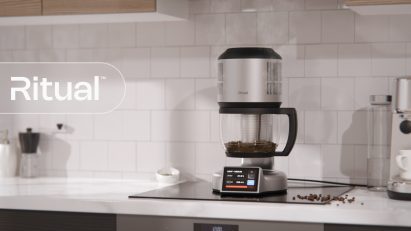 a photograph of a coffee pot on a stove