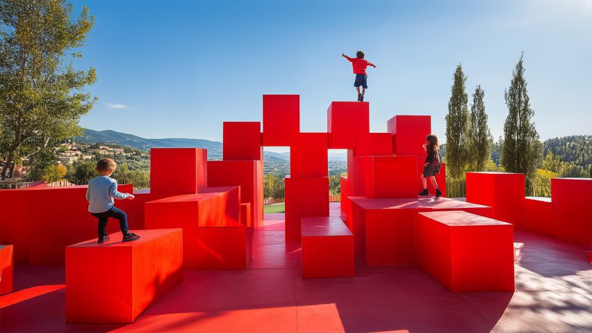 a photograph of a person atop red blocks
