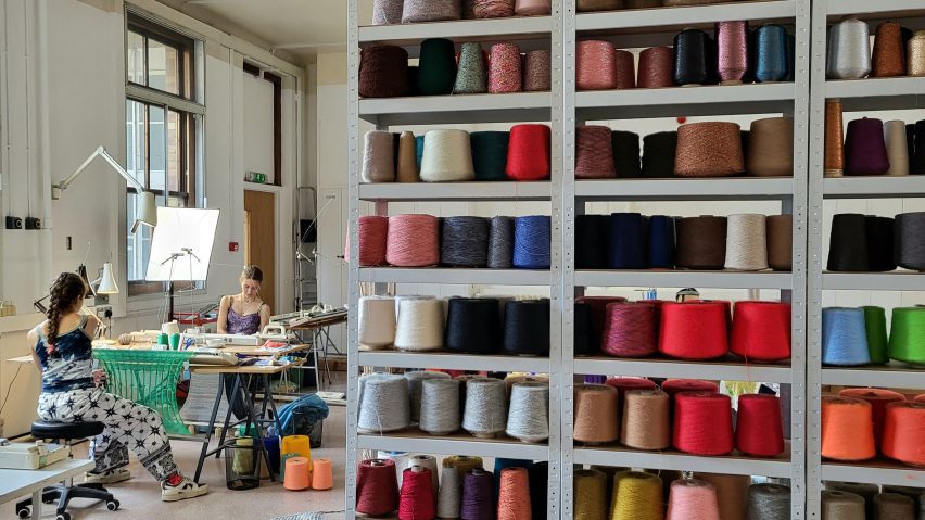 Photo of shelves of yarn and equipment in a knitting studio