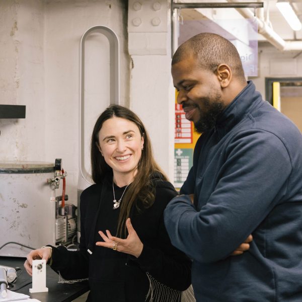 Photo of two people in a workshop