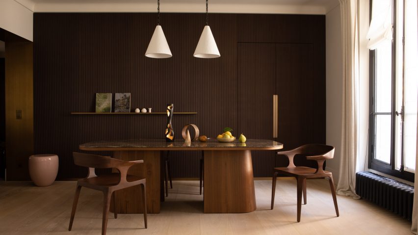 Photo of dining room with wooden table and chairs by Reda Amalou Design