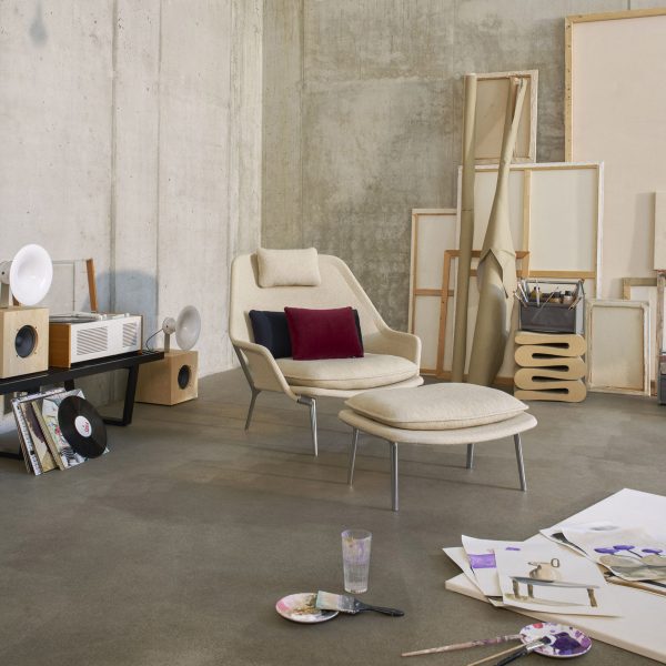 Photo of an art studio with a chair and foot rest