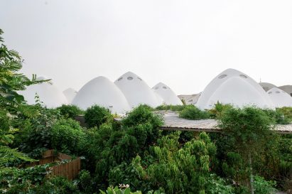 Concrete pointed-dome classrooms in Dubai by Emkaan