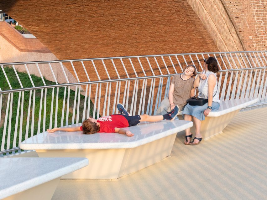 Benches on a pedestrian bridge by Ney and Partners