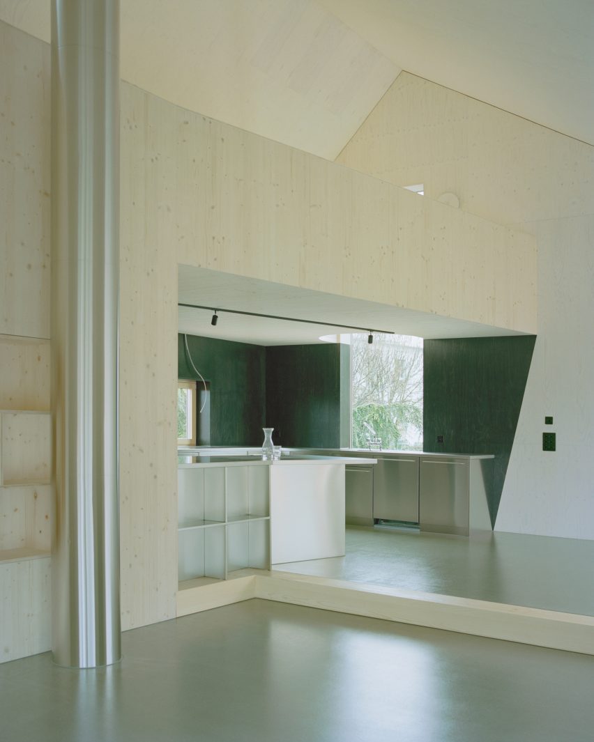 Plywood walls and stainless steel kitchen