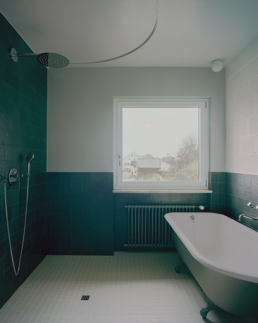 Bathroom with white and green walls