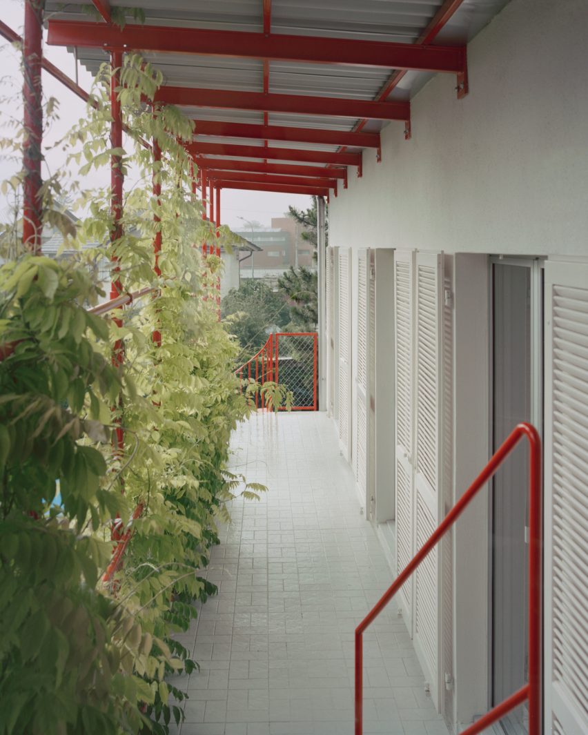 Red steel details on balcony