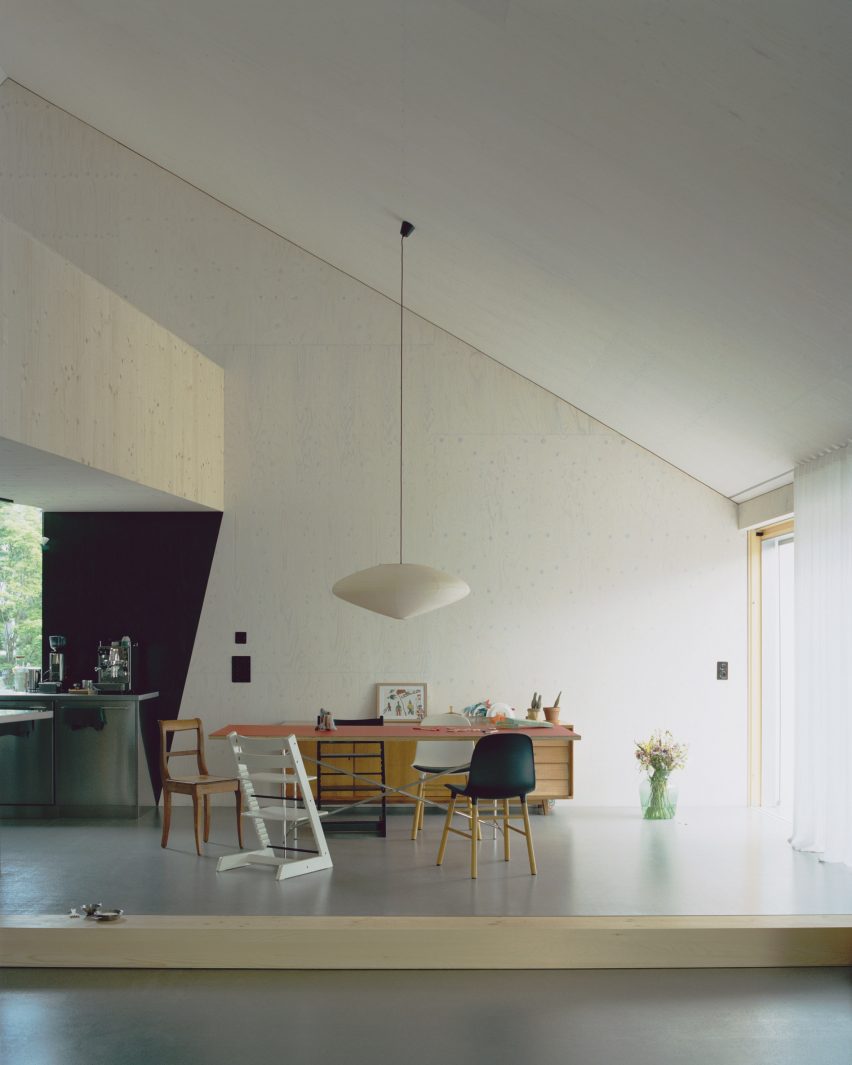 Dining table inside open-plan living space