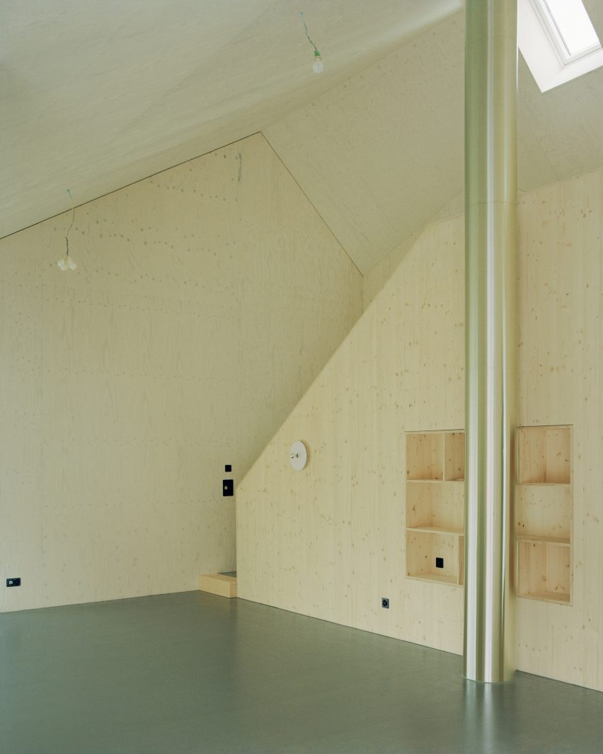 Plywood mezzanine above living space
