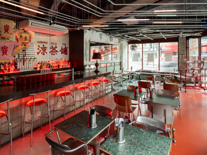 Steel chairs and red floor in Cantonese restaurant