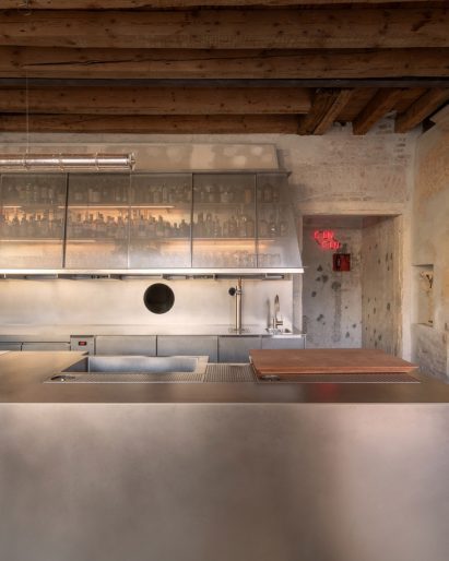 Kitchen of cafe in Arzignano, Italy, by AMAA