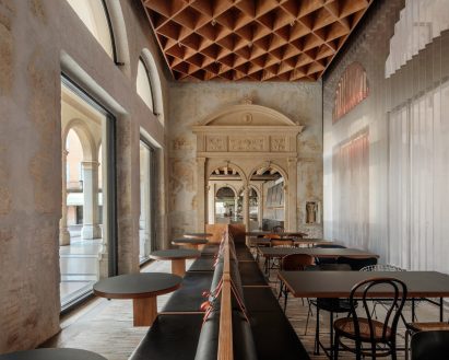 Seating area of Caffè Nazionale in Arzignano, Italy, by AMAA