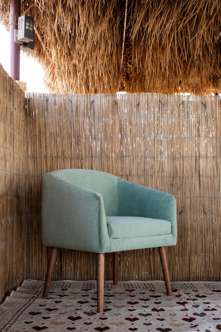 a photograph of a blue chair