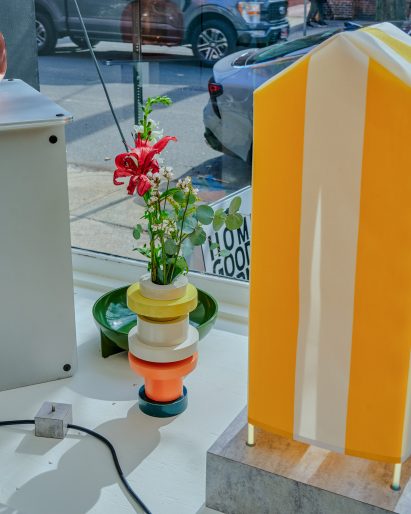 Colourful design objects in a window display