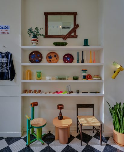 Display of seating and small objects on shelves