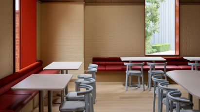 Blue chairs in school canteen
