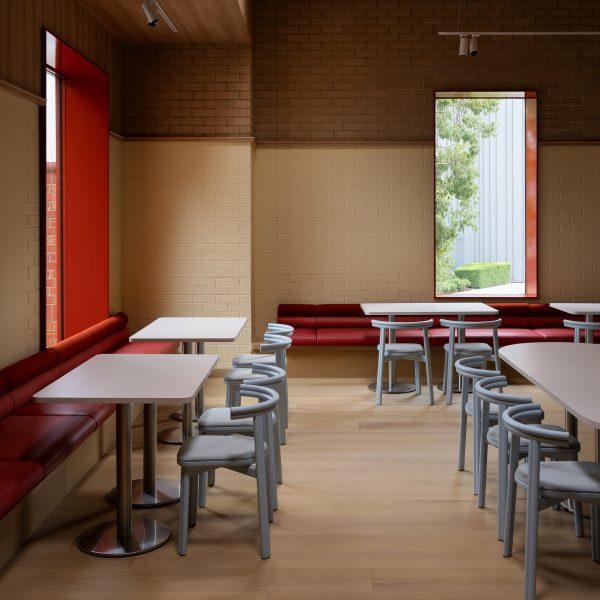 Blue chairs in school canteen