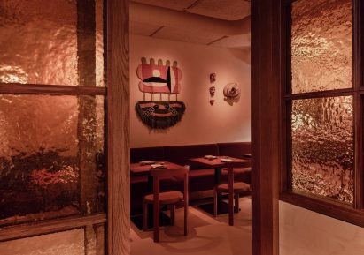 Glass panelled view into restaurant space