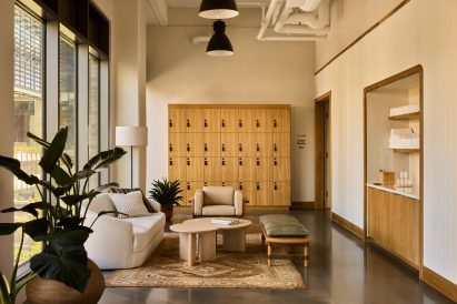 Fitness centre with a neutral palette and polished concrete floors