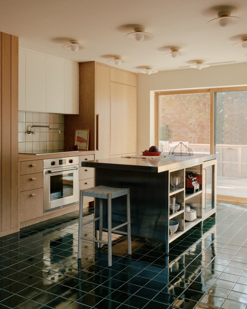Kitchen with dark-green tile floor