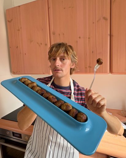 Designer Gustaf Westman with meatball plate