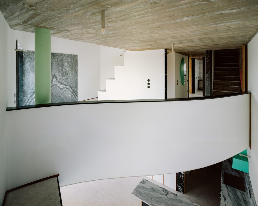 A House with an Inverted Roof by Fala Atelier