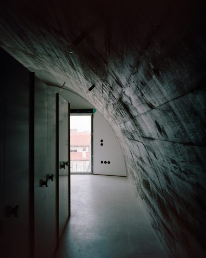 Barrel-vaulted interior of Porto home by Fala Atelier