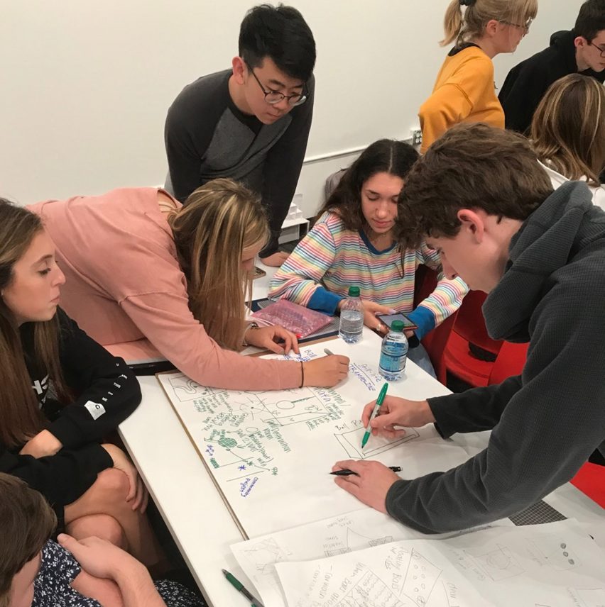 students working at a desk