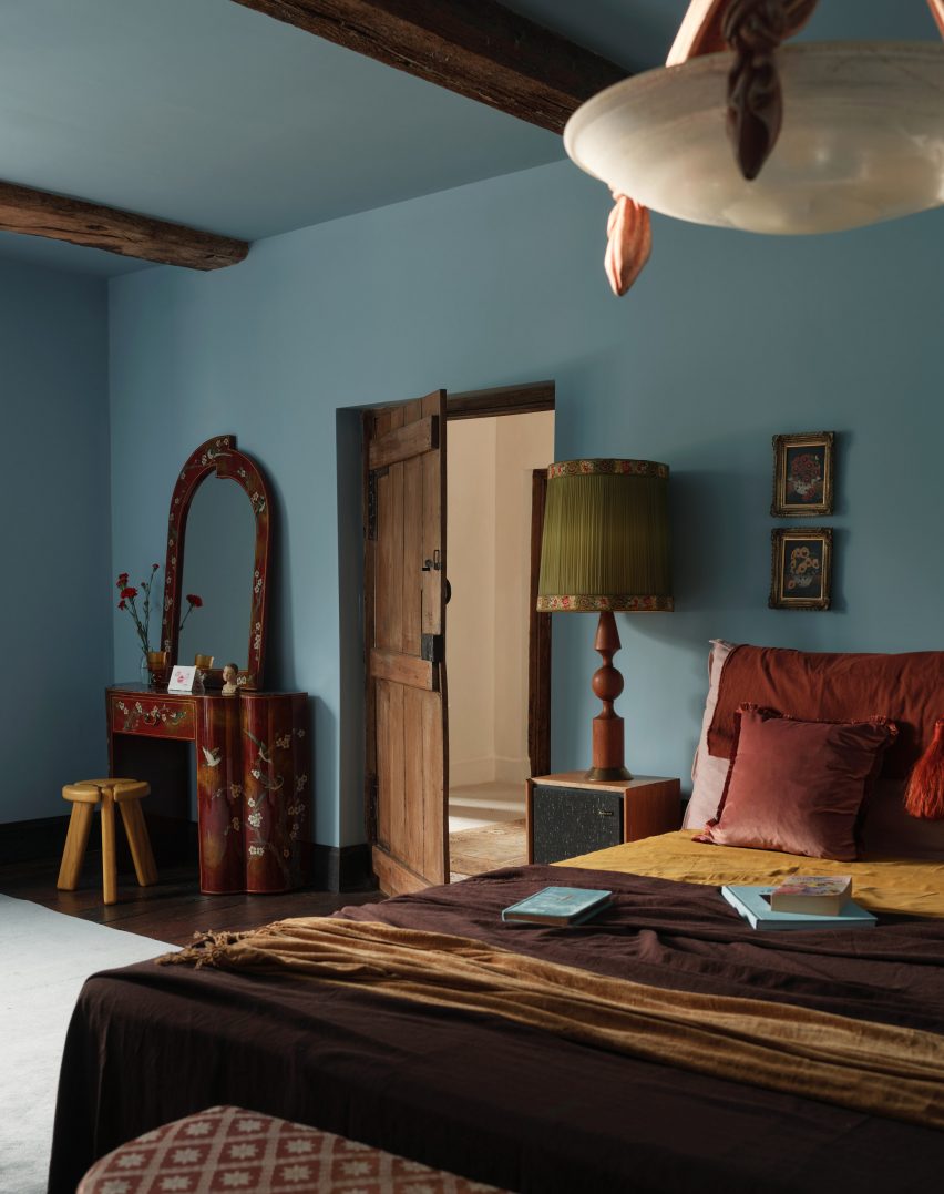 Blue bedroom in England farmhouse