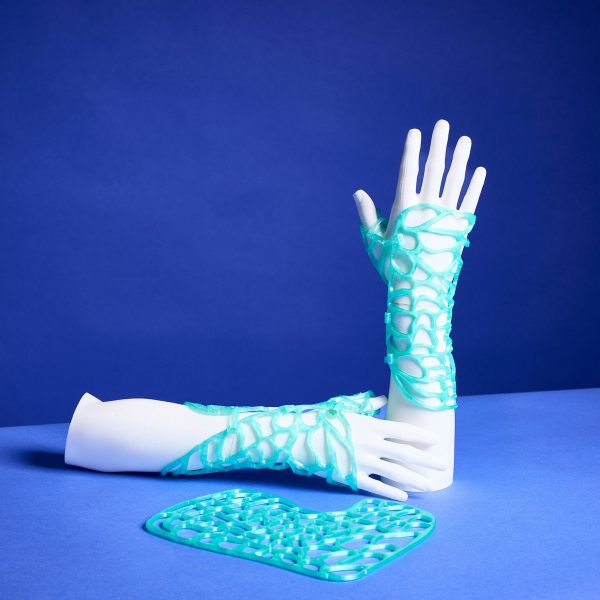 a photograph of hand mannequins with blue netting on