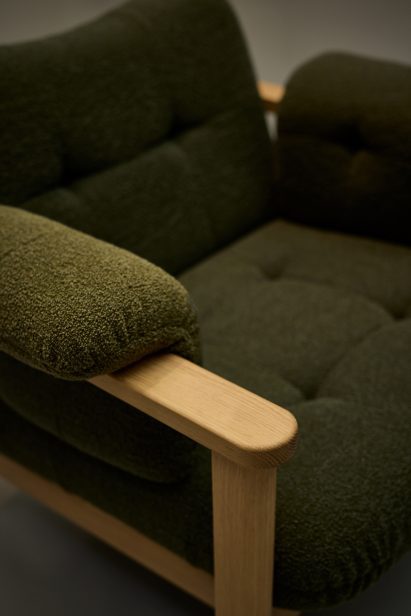 a photograph of a chair in tones of beige and green
