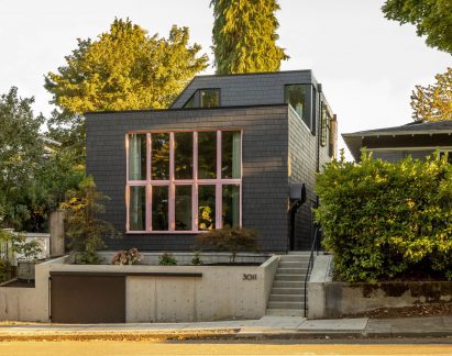 Black house with pink window mullions