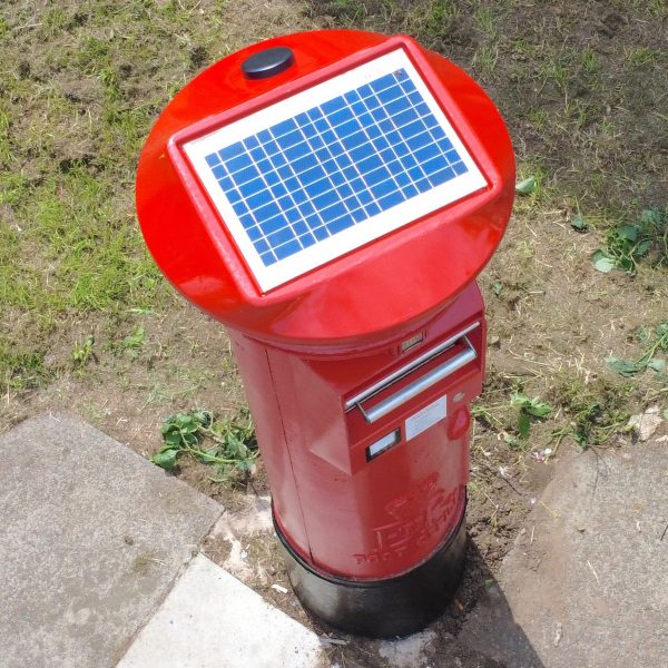 Postbox with a solar panel on its roof
