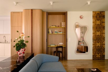 Organic-shaped mirror positioned by Mistovia