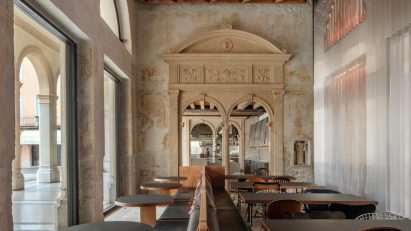 Seating area of Caffè Nazionale in Arzignano, Italy, by AMAA
