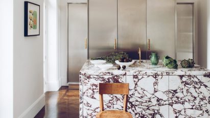 Interior with a marble kitchen island