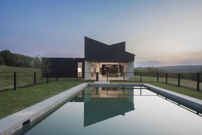 Swimming pool with black house