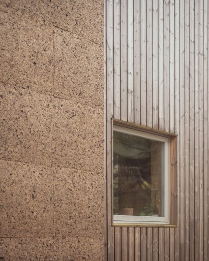 View of cork and plywood exterior of Meadow Road by Studio Bark