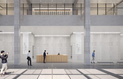 People moving in concrete lobby