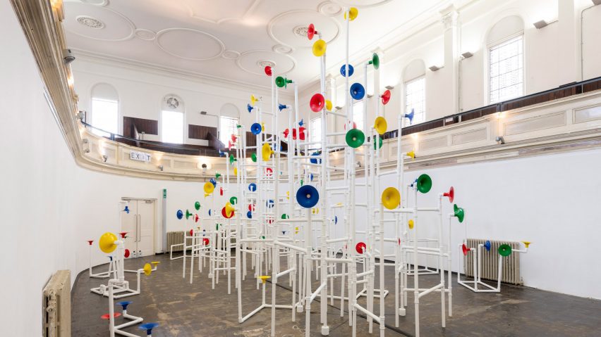 View of sound installation with pipes and horns