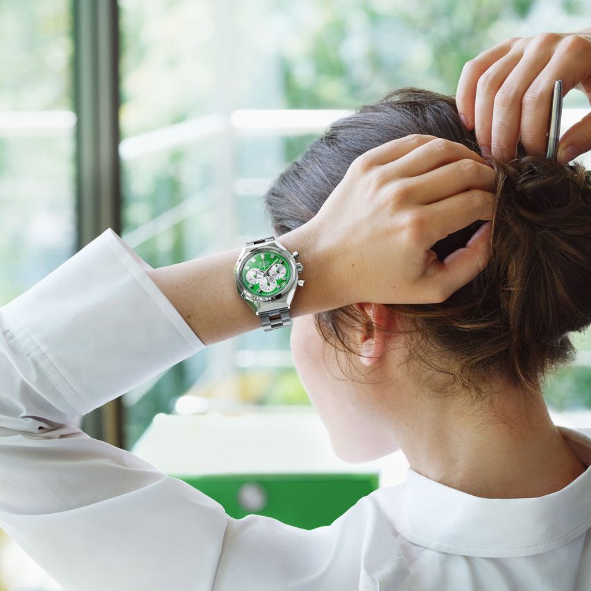 Woman wearing green watch