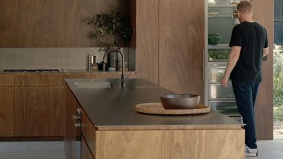 Timber kitchen featuring appliances by Fisher & Paykel